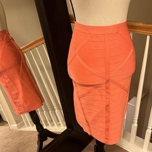 Bebe | orange bondage skirt